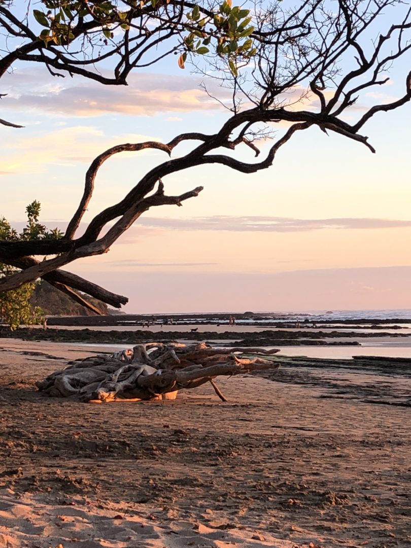 a sunset view of a costa rican beach